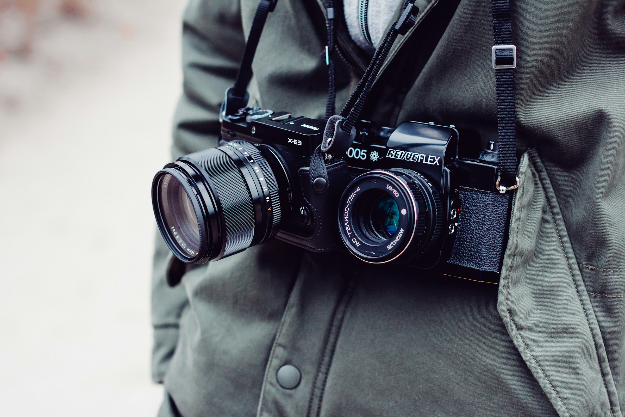 A person wearing two cameras to illustrate Google updating the CameraX library for Android mobile developers with improved dual camera functionality.