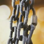 Photo of a chain illustrating the discovery of a malware campaign that takes advantage of the npm packages ecosystem for a software supply chain attack and uses the Ethereum blockchain for resilience against cyber security detection and mitigation strategies.