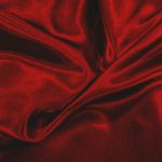 Red fabric illustrating the typosquatting of a popular Python package that steals AWS credentials from unsuspecting software developers on Linux and Windows.